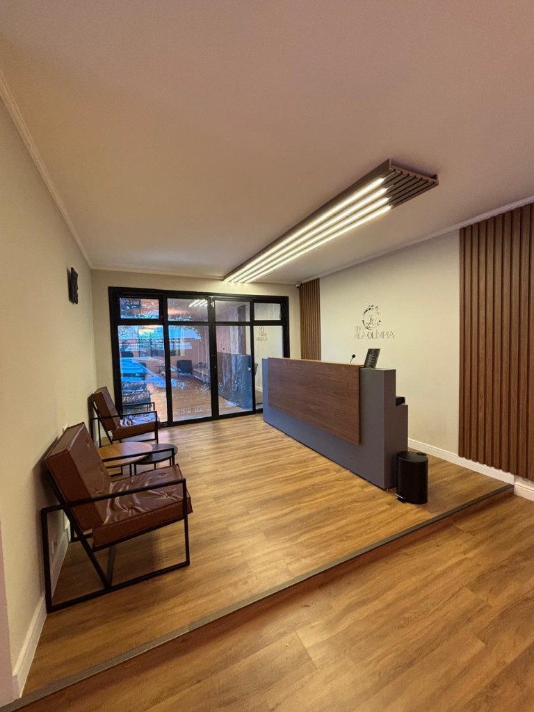 Recepção com logo SPA Vila Olímpia